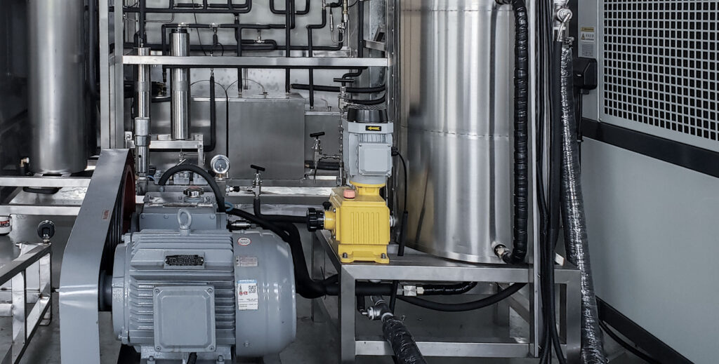 Close-up view of stainless steel internal piping in the 20L (10L×2) supercritical CO2 extractor, showcasing precision engineering and high-pressure fittings.