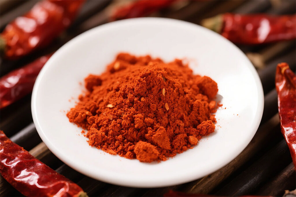 Dried chili and capsicum powder used in natural red pigment extraction process