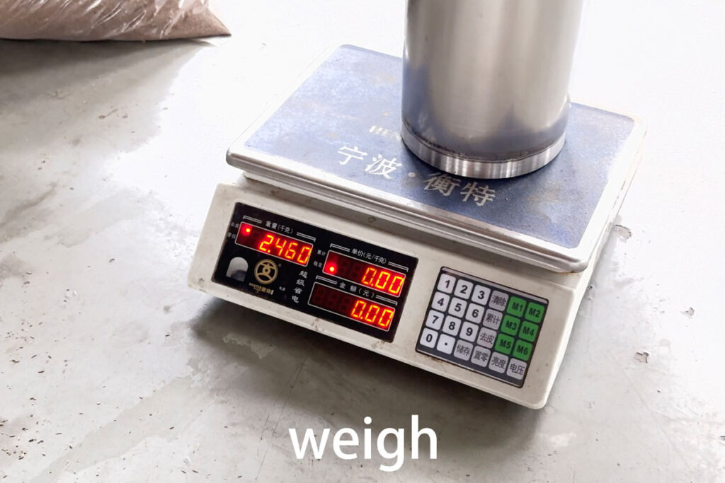 Weighing agarwood powder before extraction