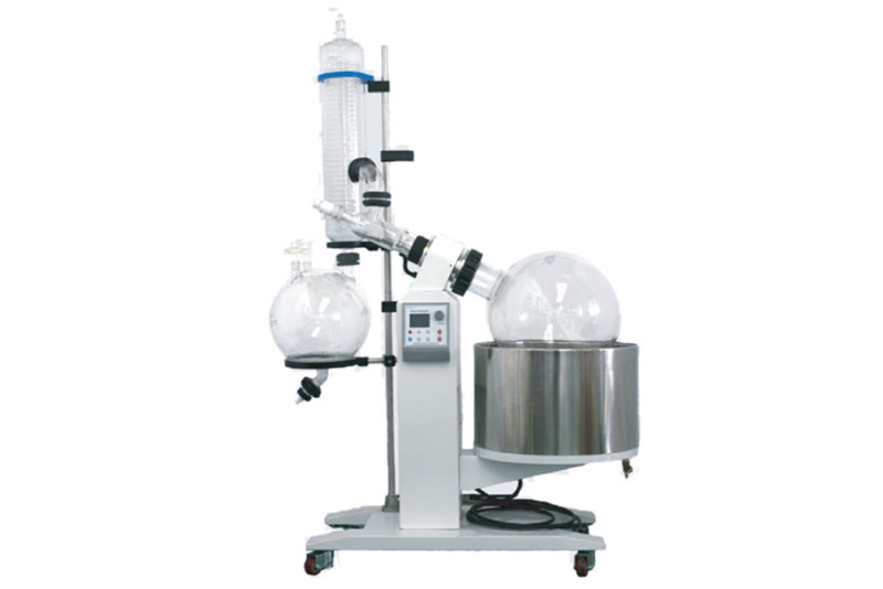 Laboratory rotary evaporator setup featuring a rotating flask, condenser, and heated water bath