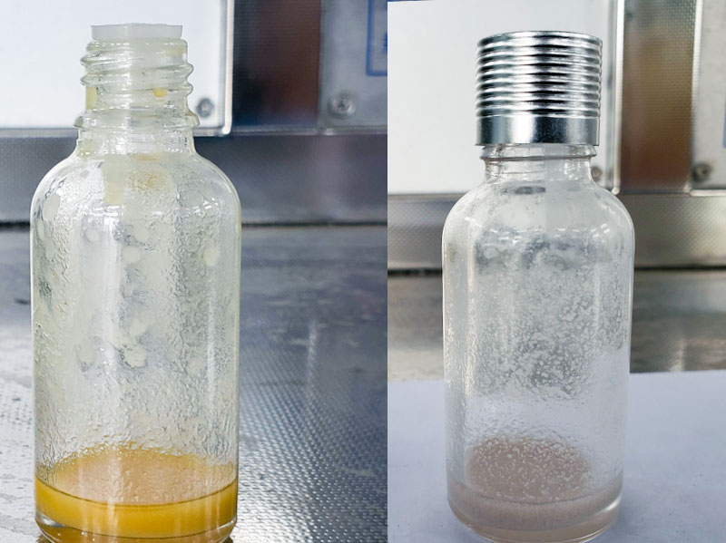 Supercritical CO2 extraction of vanilla beans showing light yellow liquid in the first separator and small amount of white liquid in the second separator